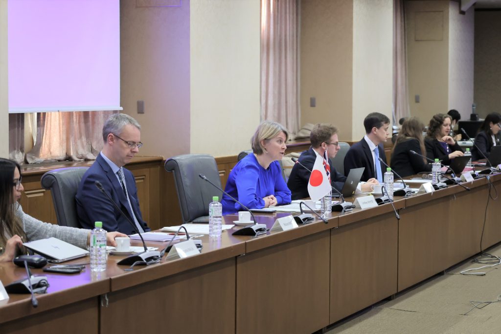 Delegates from UK and Japan sit in discussion at the Financial Dialogue